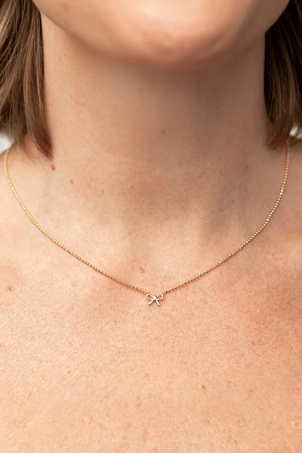 Holly Ribbon Bow Necklace | Gold Main image